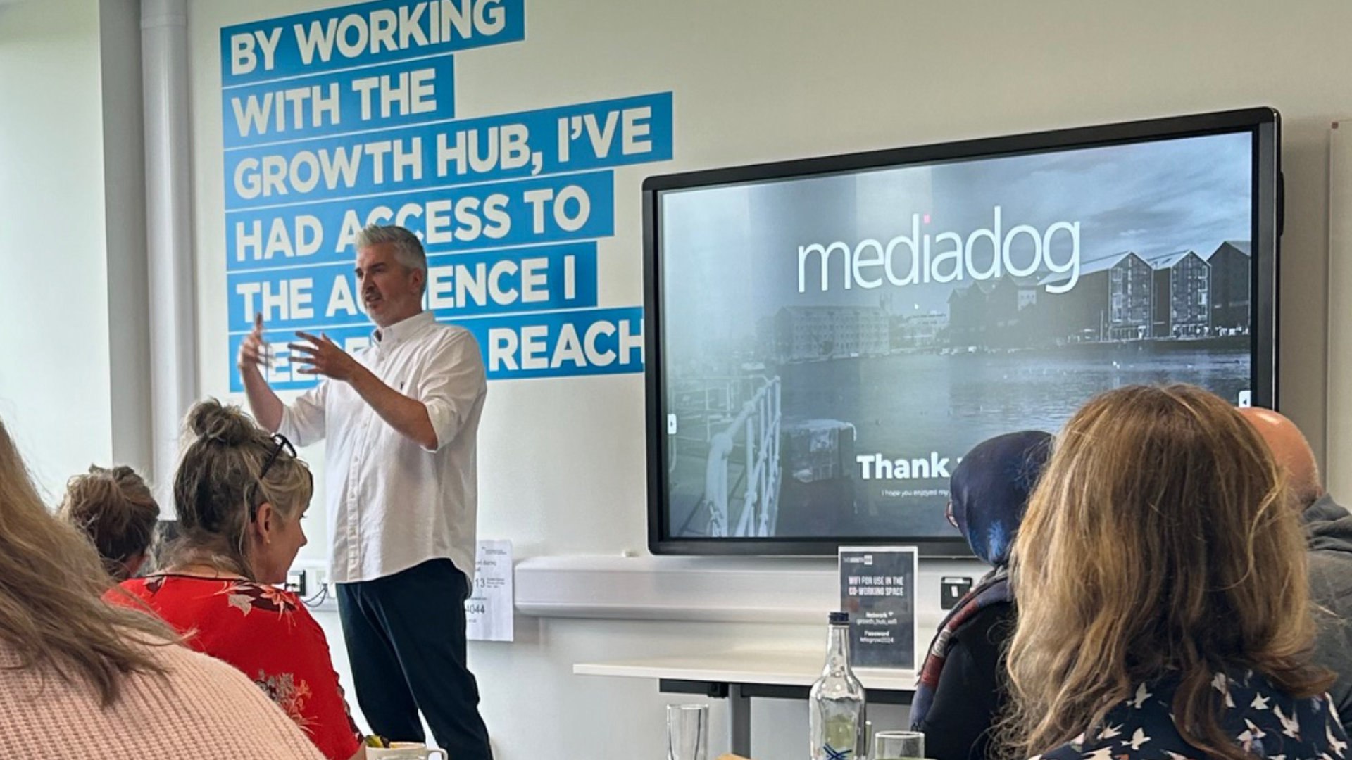 Bren Baker presenting at a business event